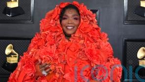 Lizzo dazzles with Dolce and Gabbana dress on Grammys red carpet