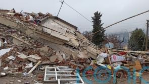 British volunteers begin earthquake rescue as other crews speak of delays