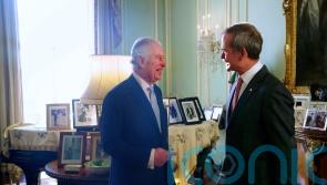 King welcomes astronaut Chris Hadfield to Buckingham Palace