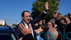 Former foreign minister leading Cyprus presidential election, exit polls show