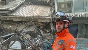 British firefighters film dramatic moment two people rescued from rubble