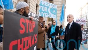 Sir Iain Duncan Smith joins protest by Uighur activists at FCDO