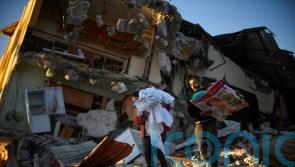 Rescuers pull more survivors from earthquake wreckage