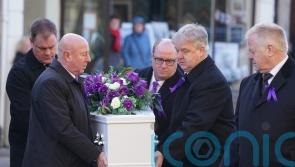 Mourners wear purple at funeral for teenager Holly Newton