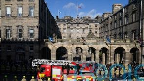 Royal Mile falls silent as thousands pay tribute to fallen firefighter
