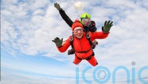 Man, 76, with prostate cancer completes 11,000ft skydive in memory of partner