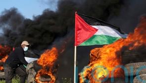 Gaza rockets and Israeli strikes follow deadly West Bank raid
