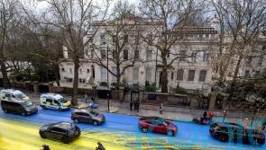 Four arrests after campaigners paint Ukrainian flag outside Russian embassy