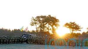 Ukrainian army trainees mark anniversary of Russian invasion at UK training camp