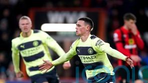 Four-goal Manchester City keep pressure on Arsenal after easing past Bournemouth