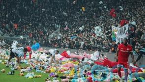 Besiktas fans throw toys onto pitch in support of those affected by earthquakes