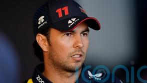 Sergio Perez sets Bahrain practice pace as Fernando Alonso splits Red Bulls