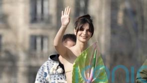 Emily Ratajkowski wears plant as a top at Paris Fashion Week