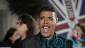Chris Kamara among football stars receiving honours at Windsor Castle