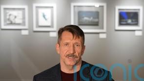 Merchant of Death shows off art in Moscow after prisoner swap with basketballer