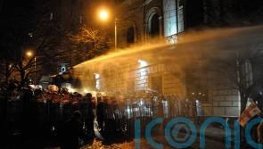 Georgian police use water cannon and tear gas to disperse protesters