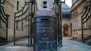 Holocaust denier handed second arrest warrant during extradition hearing