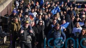Hundreds join shooting victim’s father for walk against gun and knife crime
