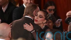 Joker: Folie à Deux castmates Lady Gaga and Brendan Gleeson unite at Oscars