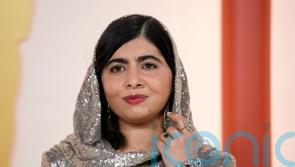 Malala Yousafzai arrives for Oscars draped in silver sequins