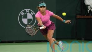 Emma Raducanu’s Indian Wells run ended by world number one Iga Swiatek
