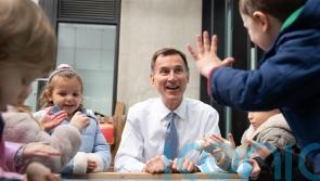 Hunt spends Budget windfall on childcare and tax breaks for wealthy pensioners