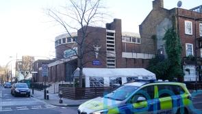 Two more men charged over funeral drive-by shooting