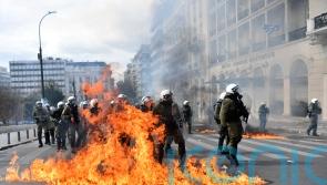 Clashes hit Athens as general strike staged in protest over rail disaster