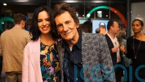 The Rolling Stones star Ronnie Wood joins family at exhibition opening in London