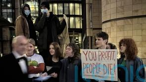 Protesters take campaign to end fossil fuels to industry’s annual dinner