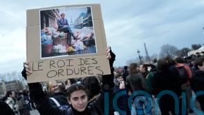 Paris streets calm after pension reform protests as rubbish piles up