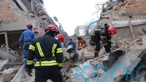 Russian drones kill four at student dormitory in Ukraine as rival summits end