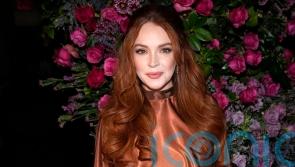 Lindsay Lohan among stars to settle with SEC over crypto case