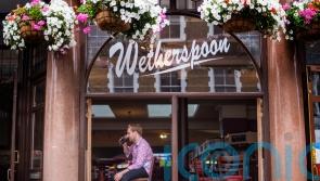 Wetherspoon toasts return to half-year profit after ‘ferocious’ inflation hit