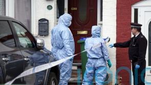 Two boys found dead at home with their mother had been strangled, inquest told