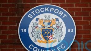 Stockport end 10-man Swindon’s resistance with late Ryan Croasdale winner