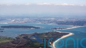 Major incident declared after oil leaks into water at Poole Harbour