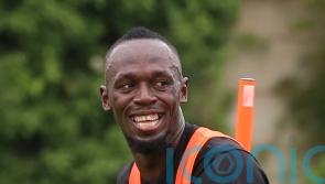 Usain Bolt asks Lauren Hemp for shirt after watching Man City beat Chelsea