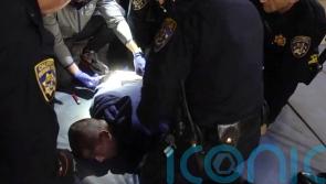 Highway patrol officers charged over death of man who said: I can’t breathe