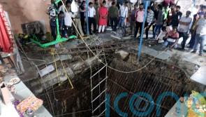Devotees killed as covering over well collapses at Indian temple