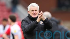 Mark Hughes praises Bradford&rsquo;s character after late winner against Grimsby