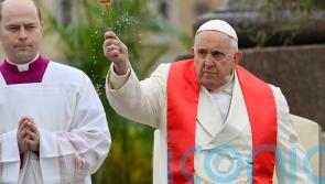 Pope Francis leads Palm Sunday Mass after hospital stay