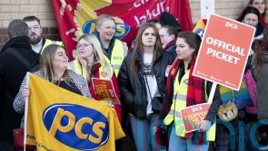 Passport workers begin five-week strike in row over pay and conditions