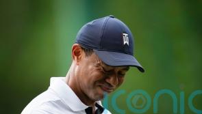 Tiger Woods makes slow start in his 25th Masters and Jon Rahm launches fightback