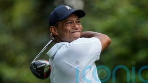 Tiger Woods labours in Masters first round as Jon Rahm stages stunning fightback