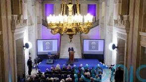 Commemorative event mixes reflections on the past and hopes for the future