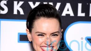 Daisy Ridley will reprise role as Jedi Rey in one of three new Star Wars films