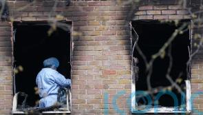 Boy, 16, released by police investigating murder of girl in flats fire