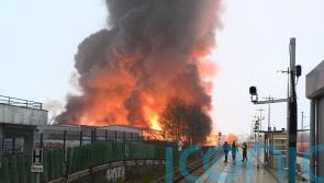 Large Hamburg fire sparks public safety alert and hits train services