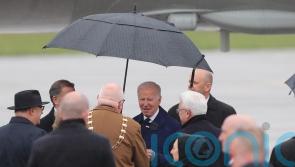 Biden braves wet and windy conditions on arrival at Dublin Airport